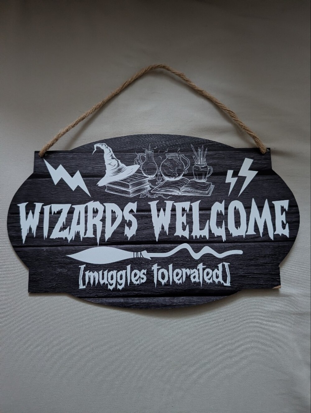 Wizards Welcome Wooden Hanging Sign in Black & White